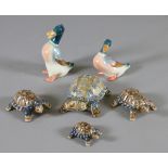 A collection of four Wade turtles along with two Beswick models of ducks.