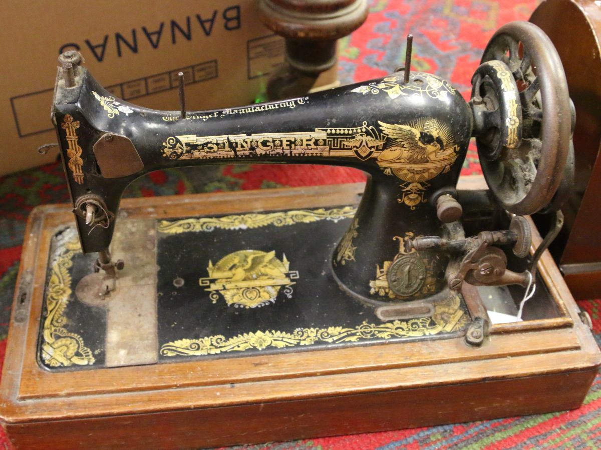 A mahogany cased Singer sewing machine.