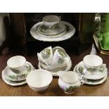 A Royal Vale china tea service decorated with country garden pattern to include six trios,