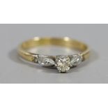 A ladies 18 carat gold and platinum shanked solitaire diamond ring 2.29 grams, UK size N.
