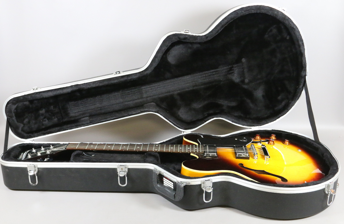 An Epiphone Dot semi-hollowbody Sunburst electric guitar in lockable gator hardcase.