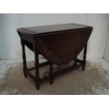 Oak Carved Edge Oval Drop Leaf Table on Turned Gate Leg Base