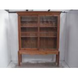 Late 19th Century Stripped Pine Sliding Double Glass Door Gun Cabinet on Pine Square Leg Stand