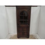 Solid Oak Tudor Style Glass Front Corner Cabinet with Carved Top