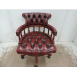 Reproduction Deep Button Oxblood Leather Upholstered Captain's Chair on Tripod Base