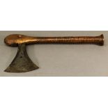 A CONGOLESE (SONGYE) COPPER-BOUND AXE late 19th century, the flared iron blade with pierced and