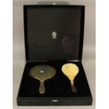 A MODERN LIBERTY 'HERA' COLLECTION SILVER BRUSH SET comprising a hand mirror and brush each with