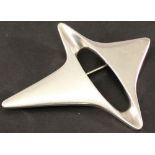 A GEORG JENSEN 925S BROOCH formed as a four pointed asymmetrical star, number 339, marked 925s.