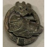 A 25 PANZER ENGAGEMENT BADGE having makers mark to reverse "JFS". CONDITION; Good, BUYERS MUST