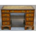 A VICTORIAN MAHOGANY PEDESTAL DESK having a rectangular top with inset tooled-leather skiver,