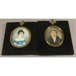 TWO 19TH CENTURY PORTRAIT MINIATURES each of oval form, watercolours on card, depicting a lady and