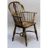 A 19TH CENTURY ELM-SEATED WINDSOR CHAIR with pierced central splat, bowed mid-rail and arms,