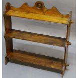 A SMALL SET EARLY 20TH CENTURY FREE STANDING OPEN BOOKSHELVES with shaped back and three plain