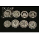 A GROUP OF EIGHT SILVER COMMEMORATIVE COINS, four 10 Yuen Chinese panda coins, three Australian