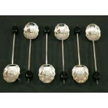 A SET OF GEORGE V SILVER COFFEE SPOONS with fluted circular bowls, slender stems with coffee bean