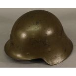 A WW2 ERA SPANISH M42 HELMET having liner to interior. CONDITION: Wear to liner, some losses of