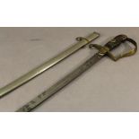 A FRENCH STYLE SWORD with brass pommel and guard, the decorated blade held in a steel scabbard.