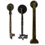 THREE 19TH CENTURY BRASS PASTRY JIGGERS, each with wheel, one having an arced cutter, 10.0cm long,