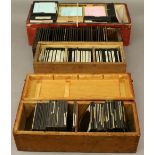 A COLLECTION OF GLASS LANTERN SLIDES approximately 250, housed in wooden boxes, various topics