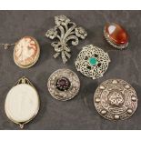 A COLLECTION OF SEVEN SILVER AND WHITE METAL BROOCHES, three of Scottish Celtic form, one cameo of