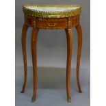 A REPRODUCTION MARBLE TOPPED AND GILT METAL MOUNTED MAHOGANY SIDE TABLE of demi-lune form with
