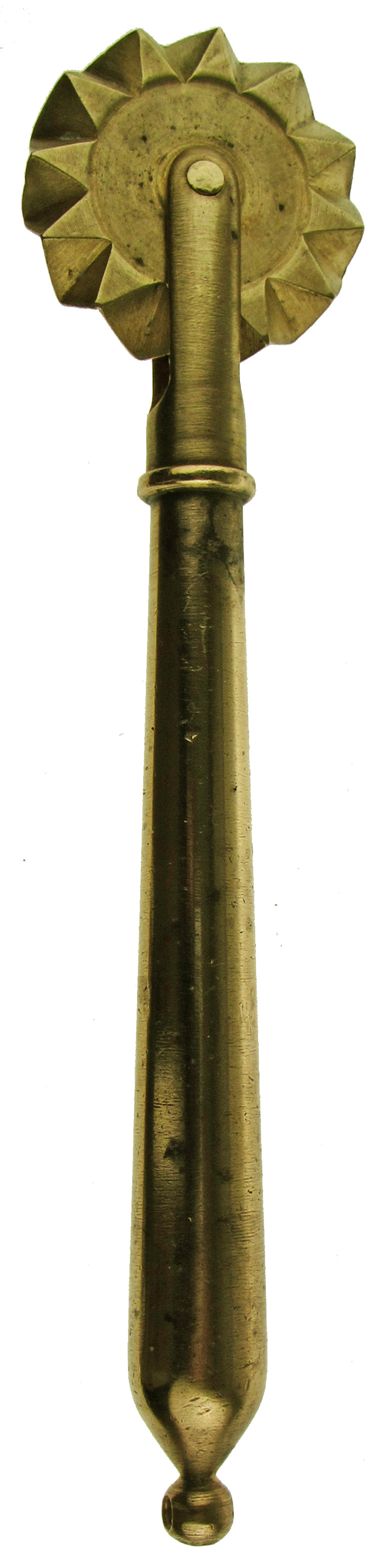 A 19TH CENTURY COPPER-ALLOY PASTRY JIGGER with tapering stem and wheel, the terminal with later ring