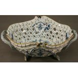 A MEISSEN PORCELAIN WHITE ONION PATTERN BOWL of shaped oval form with pierced basket pattern