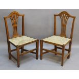 A SET OF SIX GEORGIAN TYPE MAHOGANY DINING CHAIRS each with humped top-rail, central pierced splat
