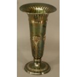 A GEORGE V SILVER VASE of flared trumpet form with moulded stylised foliate motifs and geometric