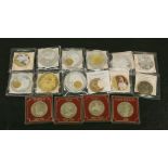 A GROUP OF COMMEMORATIVE COINAGE copper, nickel, gold and silver plated.  (16) CONDITION: Good