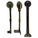 THREE 19TH CENTURY BRASS PASTRY JIGGERS, all with wheels, one having an arced cutter, 9.5cm long,