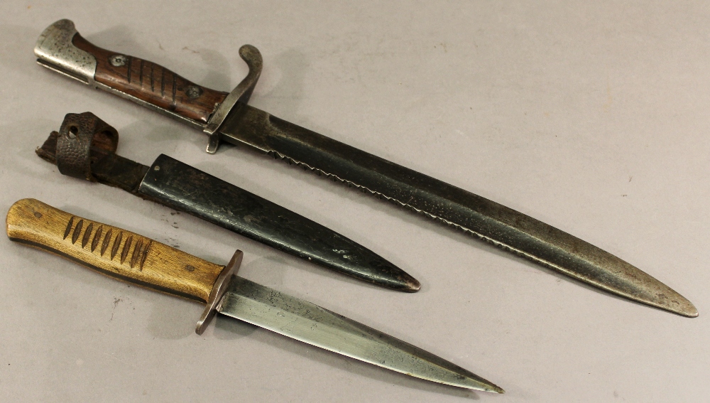 A FIRST WORLD WAR PRUSSIAN TRENCH DAGGER by F.Koeller, the blade marked with Prussian eagle and