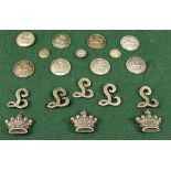 GROUP OF LOWTHER INSIGNIA INCLUDING ELEVEN LIVERY BUTTONS mounted to a green baize covered board. (