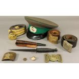 A GROUP OF NVA AND RUSSIAN ITEMS including an NVA cap and two belts also two Russian belt buckles (