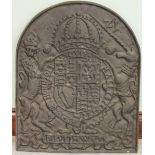 ANTIQUE CAST IRON FIRE BACK decorated with the Royal Arms and appropriate Latin motto's, cast with