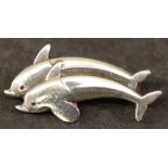 A GEORG JENSEN 925 SILVER DOLPHIN BROOCH formed as two leaping dolphins, marked 925s Denmark, import