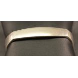 A GEORG JENSEN 925S BANGLE of angled and open circular form, marked 925s Denmark, number 423, by