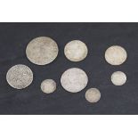 A GROUP OF GEORGIAN SILVER COINS comprising a 1787 shilling, two 1758 sixpences, 1800 3d & 4d, and