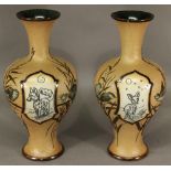 A PAIR OF DOULTON LAMBETH STONEWARE VASES by Hannah Barlow, of baluster form with flared rims,