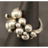 A GEORG JENSEN 925S 'MOONLIGHT GRAPES' RING formed as a bunch of grapes, the shank marked JG 925s,