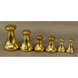 A GROUP OF SIX BRASS AVERY CAPSTAN WEIGHTS comprising 7lb, 4lb 2lb(x2) and 1lb(x2) CONDITION: Some