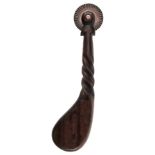 A 19TH/20TH CENTURY PASTRY JIGGER with copper wheel and spirally-carved curved oak handle,