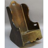 A 19TH CENTURY CHILD'S ROCKING CHAIR in the form of a lambing chair with commode aperture to the