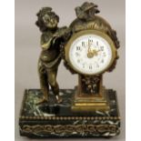 A SMALL FRENCH BRONZE AND MARBLE MANTEL CLOCK, the circular enamelled dial with bird surmount and