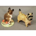 A BESWICK CAIRN TERRIER 7.5cm(h) together with a Beswick mouse with rose hips. 9cm(h)  CONDITION:
