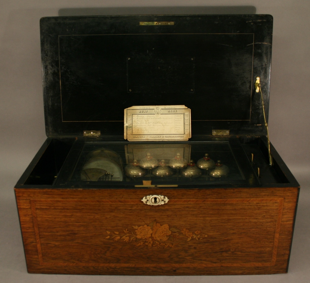 A SWISS 19TH CENTURY INLAID ROSEWOOD CYLINDER MUSIC BOX having a foliate inlaid and banded top, a - Image 2 of 2