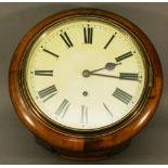 AN EARLY 20TH CENTURY MAHOGANY CASED WALL CLOCK of circular form with Roman hours to the chapter