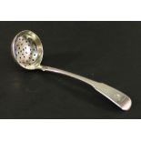 A SCOTTISH PROVINCIAL SILVER SIFTING SPOON fiddle pattern with pierced circular bowl, engraved