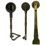 THREE 19TH CENTURY BRASS PASTRY JIGGERS, each with wheel, one having a heart-shaped cutter, 10.0cm
