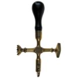 A LATE 18TH/EARLY 19TH CENTURY CRUCIFORM PASTRY JIGGER with brass wheel, lozenge-form and circular